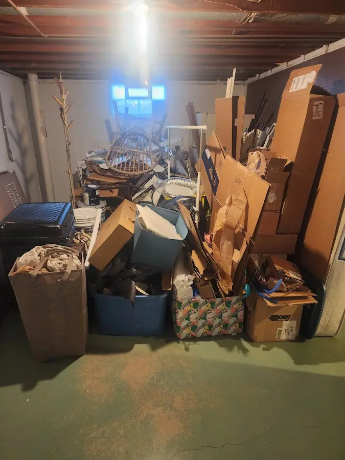 Roll-off dumpster container at job site for Yard Waste Dumpster Rental in Alexandria